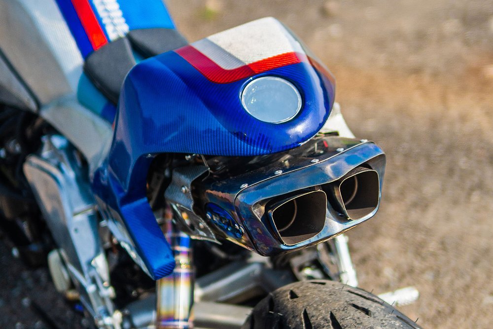 close view of the exhaust under the single-seat rear tail section