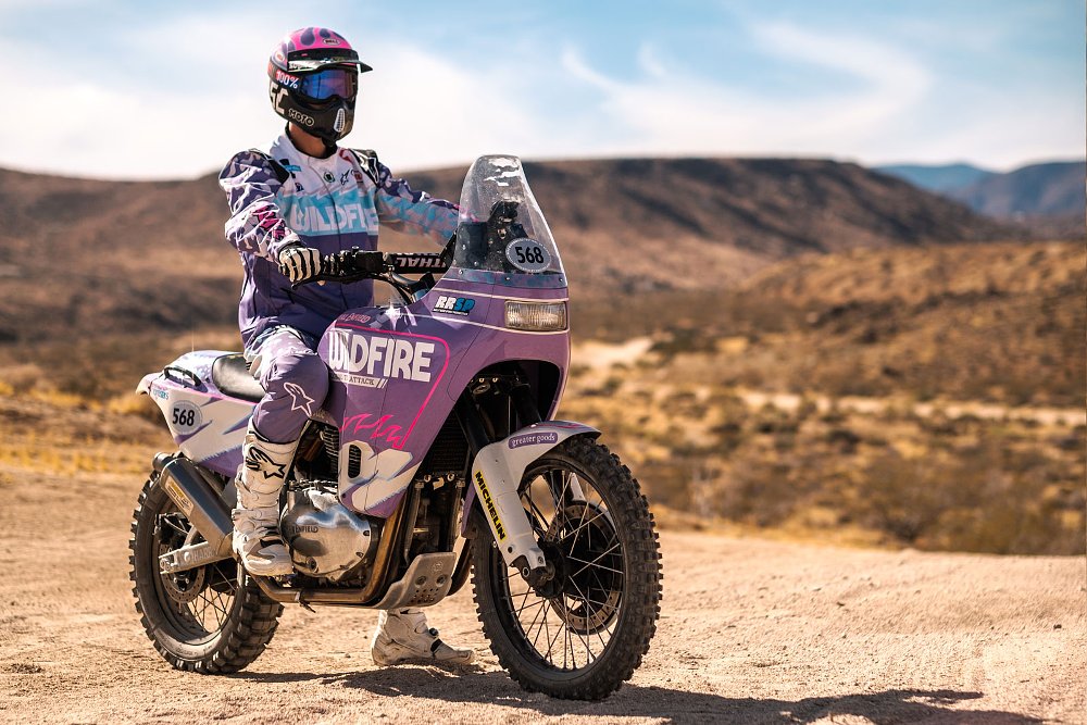 retro style rally motorcycle in purple, pink, and white colors
