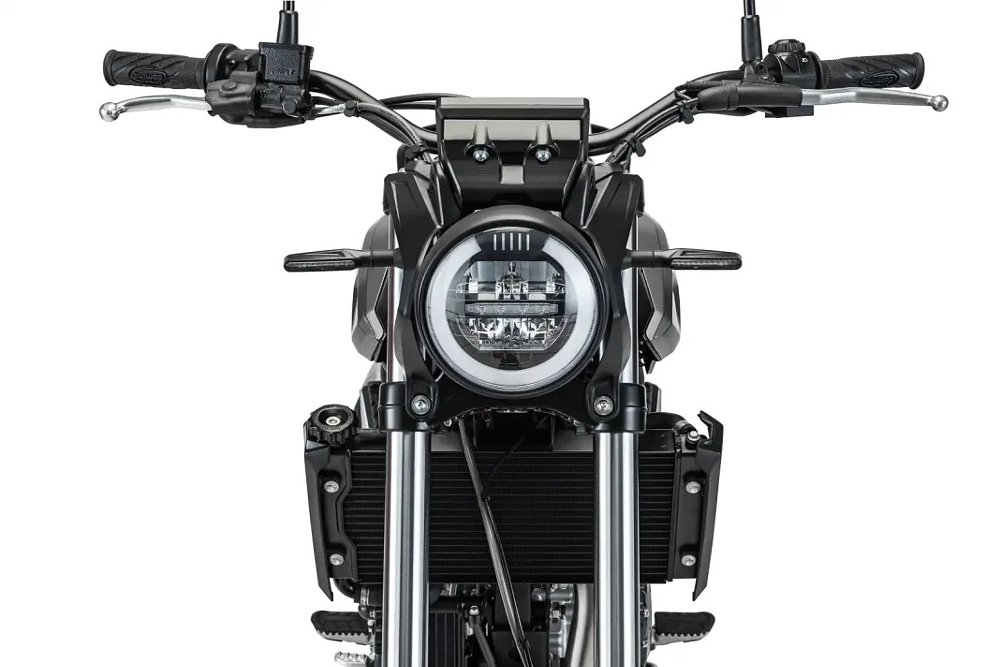 studio photo of the front view of the Alp X showing the round headlight