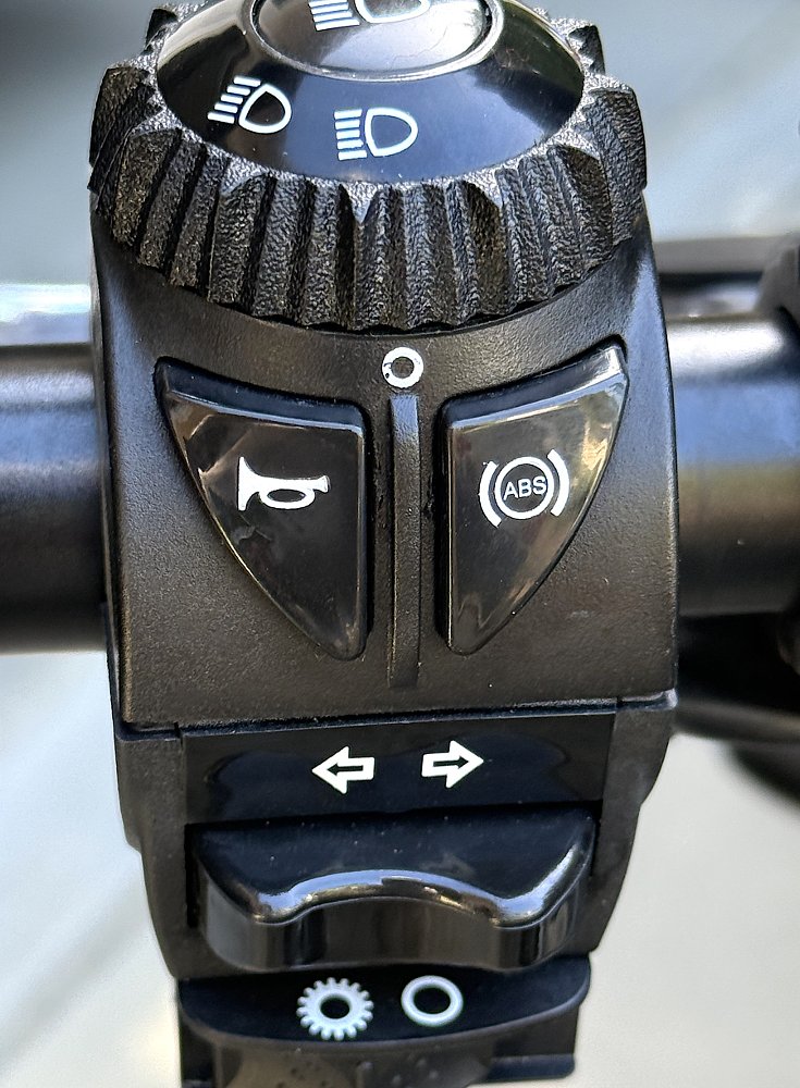 close image of switchgear with round wheel on top